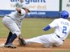 Kent State shortstop Jimmy Rider tags out Kentucky's Zac Zellers during an NCAA college baseball tournament regional game in Gary, Ind., Friday, June 1, 2012. (AP Photo/Joe Raymond)