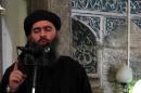 An image grab taken from a propaganda video released on July 5, 2014 by al-Furqan Media allegedly shows the leader of the Islamic State (IS) jihadist group, Abu Bakr al-Baghdadi, adressing Muslim worshippers at a mosque in Mosul