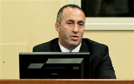 Kosovo's former Prime Minister and former commander of the Kosovo Liberation Army Ramush Haradinaj attends the judgement in his retrial at the International Criminal Tribunal for the former Yugoslavia in The Hague November 29, 2012. REUTERS/Koen van Weel/Pool