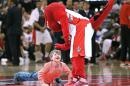 A young Raptor fan performs during a timeout between the Brooklyn Nets and the Toronto Raptors in game one of the NBA Eastern Conference play-off at the Air Canada Centre on April 19, 2014 in Toronto, Ontario, Canada