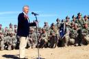 U.S. Secretary of Defense Chuck Hagel speaks to members of 3rd Brigade, 4th Infantry Division, at the National Training Center in Fort Irwin, Calif. on Sunday, Nov. 16, 2014. Wary of a more muscular Russia and China, Hagel said Saturday the Pentagon will make a new push for fresh thinking about how the U.S. can keep and extend its military superiority despite tighter budgets and the wear and tear of 13 years of war. (AP Photo/Robert Burns)