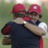 USA's captain Davis Love III hugs Phil Mickelson on the 17th hole after winning a four-ball match at the Ryder Cup PGA golf tournament Friday, Sept. 28, 2012, at the Medinah Country Club in Medinah, Ill. (AP Photo/Charlie Riedel)