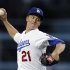 Los Angeles Dodgers starter Zack Greinke pitches to the Pittsburgh Pirates in the first inning of a baseball game in Los Angeles, Friday, April 5, 2013. (AP Photo/Reed Saxon)