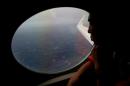 Koji Kubota of the Japan Coast Guard keeps watch for debris on board the Japan Coast Guard Gulfstream V aircraft whilst in the search zone for debris from Malaysia Airlines flight MH370 on April 1, 2014