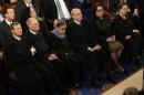 U.S. Supreme Court Chief Justice Roberts and associate justices listen to U.S. President Obama as he delivers his State of the Union address to a joint session of the U.S. Congress on Capitol Hill in Washington