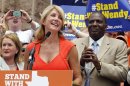 Democratic Senators Wendy Davis and Royce West at a protest before the start of a special session of the Texas legislature in Austin, Texas