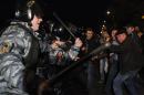 Russian police scuffle with protesters in the Biryulyovo district of Moscow