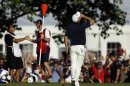 Justin Rose, of England, reacts after a putt on the 18th hole during the fourth round of the U.S. Open golf tournament at Merion Golf Club, Sunday, June 16, 2013, in Ardmore, Pa. (AP Photo/Julio Cortez)