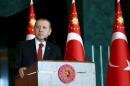 Turkey's President Tayyip Erdogan addresses the audience during a meeting in Ankara