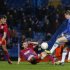 Fernando Torres of Chelsea tries to get round Lukasz Szukala and Adrian Popa of Steaua Bucharest during their Europa League match at Stamford Bridge in London