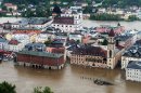 Parts of the old town re flooded by the river Danube in Passau, southern Germany, Sunday, June 2, 2013. Heavy rainfalls cause flooding along rivers and lakes in Germany, Austria and the Czech Republic. (AP Photo/dpa, Armin Weigel)