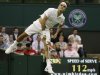 Roger Federer of Switzerland serves to Julien Benneteau of France during a third round men's singles match at the All England Lawn Tennis Championships at Wimbledon, England, Friday, June  29, 2012. (AP Photo/Alastair Grant)