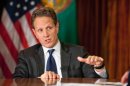 U.S. Treasury Secretary Geithner gestures as he is interviewed in Washington for "Face the Nation"