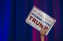 A supporter holds up a sign at the election watch party for Republican presidential candidate Donald Trump in Spartanburg, South Carolina on February 20, 2016