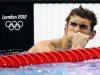 Michael Phelps of the U.S. looks up after his men's 200m butterfly heat at the London 2012 Olympic Games