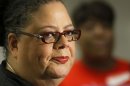 Karen Lewis, president of the Chicago teachers union listens to a question after meeting of the union's House of Delegates Friday, Sept. 14, 2012, in Chicago. Lewis told the delegates that a 