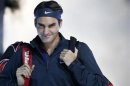 Switzerland's Roger Federer arrives for his final tennis match at the ATP World Tour Finals against Serbia's Novak Djokovic at the O2 Arena in London