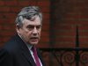 Former British Prime Minister Gordon Brown arrives to give evidence before the Leveson Inquiry into the ethics and practices of the media at the High Court in London