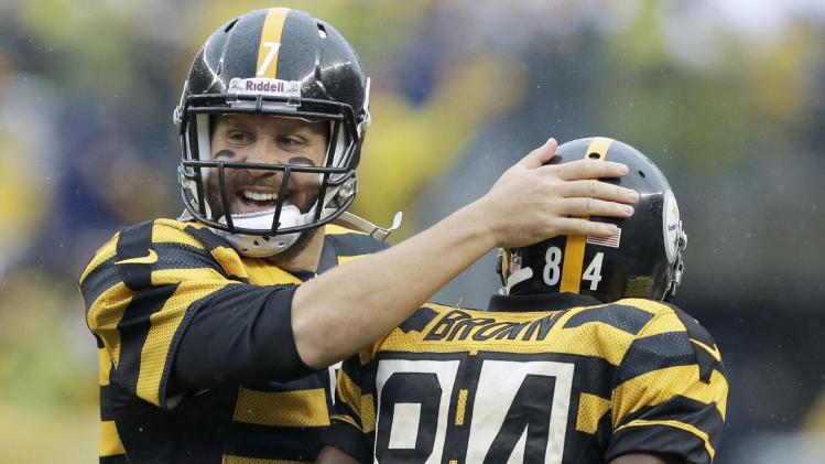 Pittsburgh Steelers quarterback Ben Roethlisberger (7) celebrates with wide receiver Antonio Brown (84) after the two connected for a touchdown catch in the first half of an NFL football game against the Detroit Lions in Pittsburgh, Sunday, Nov. 17, 2013
