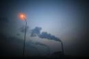 Smoke rises from chimneys of a thermal power plant near Shanghai