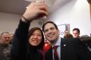 Republican presidential candidate, Sen. Marco Rubio, R-Fla. poses for a photo during a campaign event, Monday, Jan. 25, 2016 in Des Moines, Iowa. (AP Photo/Paul Sancya)