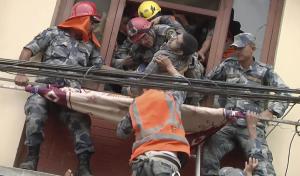 In this image made from video, rescue workers pull &hellip;