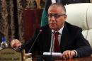 Libyan Prime Minister Ali Zeidan speaks during a press conference in Tripoli on October 30, 2013