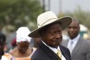 Uganda's President Yoweri Museveni arrives for an anniversary parade in Kasese town