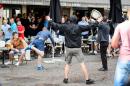 A man throws a chair as a small group of Russian men provoke a group of England supporters in the centre of Lille, on June 14, 2016, three days after Russia and England football fans clashed in the southern French city of Marseille