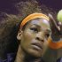 Williams of the U.S. serves the ball to Azarenka of Belarus during the final match at the Qatar Open tennis tournament in Doha