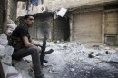 Un ribelle dell'esercito di liberazione siriano nei pressi di Damasco