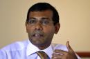 Maldives' former president Mohamed Nasheed gestures as he speaks to reporters in Male, Maldives, Sunday, Oct. 20, 2013. Nasheed, a leading candidate in the Maldives' troubled presidential election, demanded that President Mohamed Waheed Hassan should resign immediately and allow the Parliament speaker to take over the government and call a fresh election. (AP Photo/Sinan Hussain)