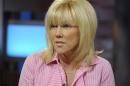 This image released by ABC shows Rielle Hunter during an interview on the morning show "Good Morning America," Tuesday, June 26, 2012 in New York. Hunter says she and former presidential candidate John Edwards have ended their relationship. Hunter told ABC's "Good Morning America" on Tuesday that she and Edwards were still a couple until late last week, as details from Hunter's memoir "What Really Happened: John Edwards, Our Daughter and Me," became public. The breakup was painful, but Hunter said Edwards will still be involved with their daughter, Quinn, who is 4 years old and lives with Hunter. (AP Photo/ABC, Ida Mae Astute)