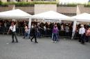 People stand in line as they gather outside a validation center during Venezuela's National Electoral Council (CNE) second phase of verifying signatures for a recall referendum against President Nicolas Maduro, in Caracas