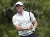 Rory McIlroy, of Northern Ireland, watches his tee shot on the second hole during the second round of the Texas Open golf tournament, Friday, April 5, 2013, in San Antonio. (AP Photo/Eric Gay)