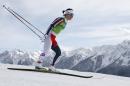 Norway's Marit Bjoergen skis during the women's classical-style cross-country team sprint competitions at the 2014 Winter Olympics, Wednesday, Feb. 19, 2014, in Krasnaya Polyana, Russia. (AP Photo/Dmitry Lovetsky)