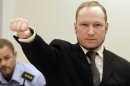 Mass murderer Anders Behring Breivik, makes a salute after he arrives at the court room in a courthouse in Oslo Friday Aug. 24, 2012 . Breivik has been declared sane and sentenced to prison for bomb and gun attacks that killed 77 people last year. (AP Photo/Frank Augstein)