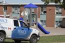 A Charlottetown Police vehicle drives into Sherwood Elementary School in Charlottetown Prince Edward Island