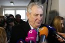 Presidential candidate Milos Zeman talks to media after casting his vote in presidential elections at a polling station in Prague, Czech Republic, Friday, Jan. 11, 2013. (AP Photo/Petr David Josek)