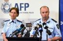Police assistant commissioner Neil Gaughan (R) explained two men were arrested as quickly as possible for breaching Australia's foreign fighter laws