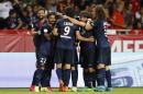 Paris Saint-Germain's Argentinian forward Ezequiel Lavezzi (2ndL) is congratulated by teammates after scoring a goal during the French L1 football match Monaco (ASM) vs Paris Saint-Germain (PSG), on August 30, 2015 at the Louis II stadium in Monaco