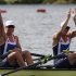 Britain's Anna Watkins and Katherine Grainger react after the women's double sculls heat at Eton Dorney during the London 2012 Olympic Games