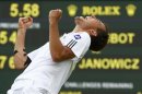 Jerzy Janowicz of Poland celebrates after defeating Lukasz Kubot of Poland in their men's quarter-final tennis match at the Wimbledon Tennis Championships, in London