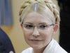 FILE -  This is a Monday, July 11, 2011 file photo of former Ukrainian Prime Minister Yulia Tymoshenko during a trial hearing at the Pecherskiy District Court in Kiev. The judge in the abuse-of-office trial of former Ukrainian Prime Minister Yulia Tymoshenko gave strong indication she would be found guilty Tuesday, Oct. 11, 2011 saying in his summary that she caused major losses to the national gas company.  (AP Photo/Sergei Chuzavkov, File)