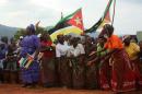 Frelimo supporters dance and sing during a visit by Mozambique's President in Catandica, in the central province of Manica on October 29, 2013