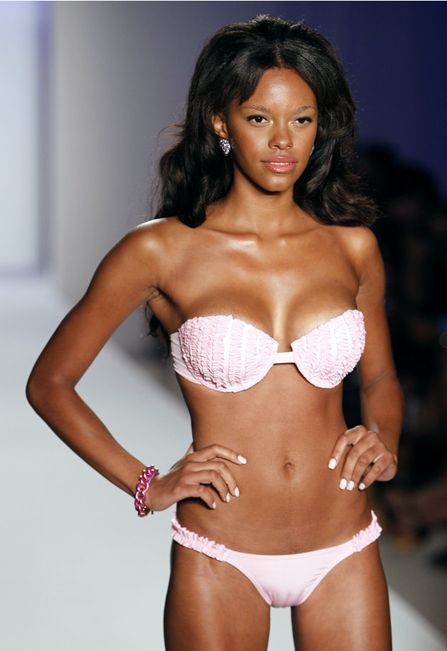 A model wears swimwear from the collection of White Sands Australia during the Mercedes-Benz Fashion Week Swim 2013 show, Sunday, July 22, 2012, in Miami Beach, Fla. (AP Photo/Lynne Sladky)