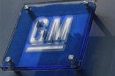 The General Motors logo is seen outside its headquarters at the Renaissance Center in Detroit