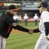 Baltimore Orioles manager Showalter shakes hands with New York Yankees manager Girardi before Game 3 of their MLB ALDS baseball playoff series in New York