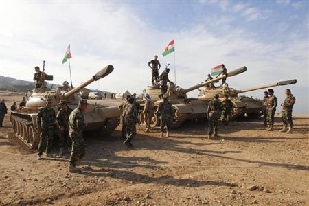 Kurdish Peshmerga troops and tanks are deployed on the outskirts of Kirkuk, some 250km (155 miles) north of Baghdad December 3, 2012. REUTERS/Ako Rasheed