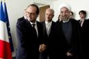 Iran's President Hassan Rouhani (R) and his French counterpart Francois Hollande meet on the sidelines of the U.N. General Assembly in New York